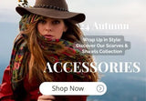 LOVEMI model wearing a wide-brim hat and a floral scarf against a scenic autumn backdrop, promoting the LOVEMI accessories collection, specifically scarves and shawls.