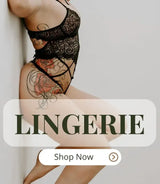 LOVEMI model in black lace lingerie with rose tattoo design, lying on her side, showcasing the LOVEMI lingerie collection.